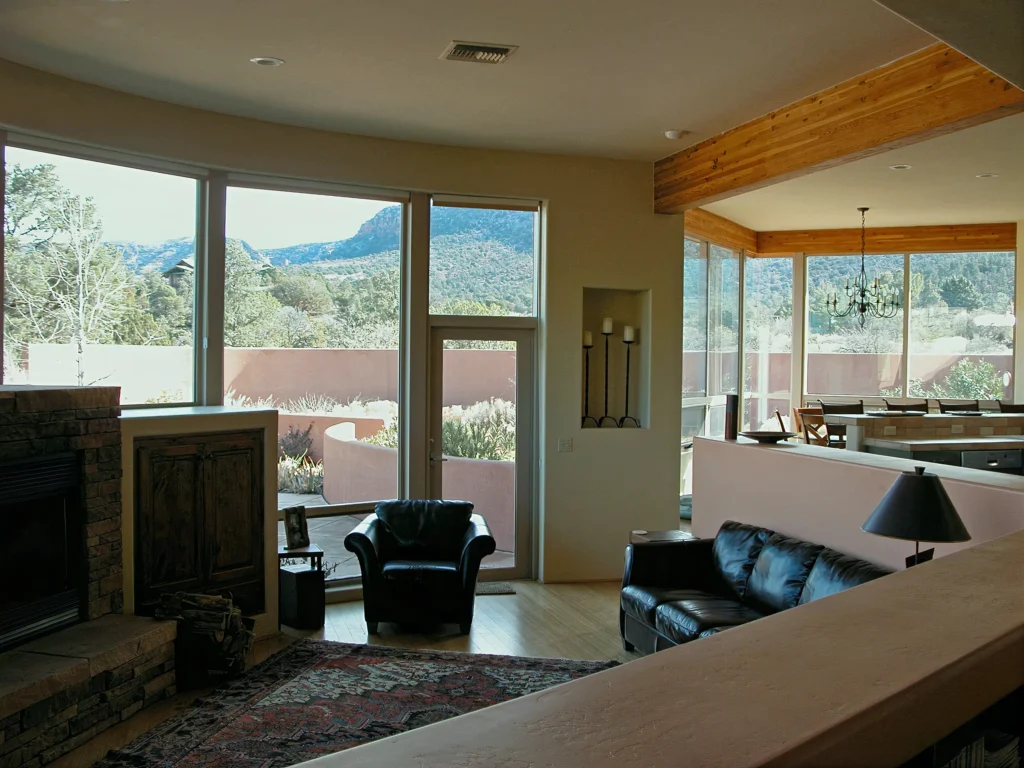 Sitting area illuminated by natural light from surrounding windows.